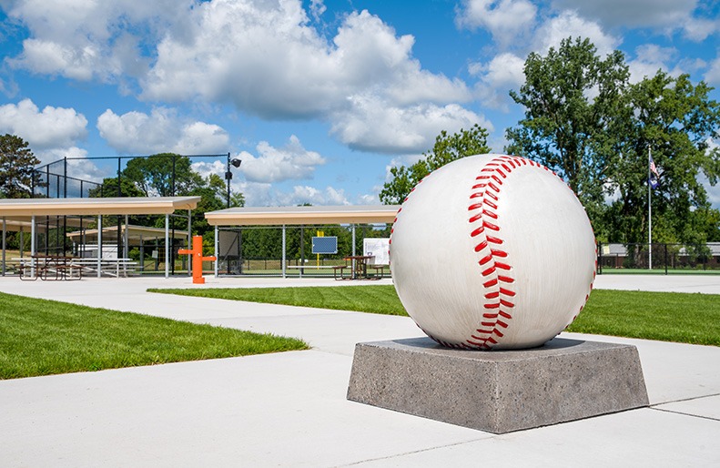 A concrete baseball monument at the Middle of the Mitt Miracle Field facility.