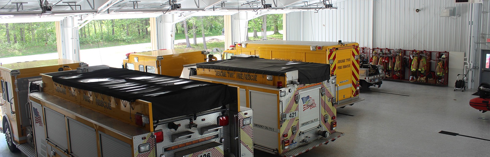 Fire rescue vehicles stationed inside the Jerome Township Fire Department.